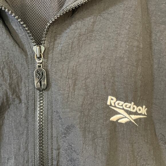 Vintage Reebok Windbreaker Jacket M Black Nylon Zip Up Logo Spell Out 90s Y2K - Picture 5 of 9